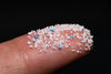 microplastics on finger